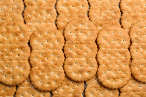 Preview: Many delicious crackers as background, top view
