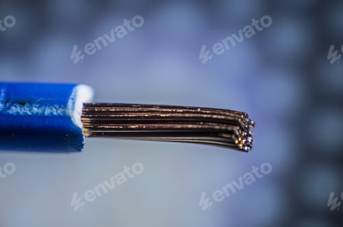 Preview: Selective focus shot of a bared copper on bokeh lights background