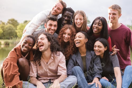 Preview: Group of friends from different cultures enjoying an afternoon outdoors lifestyle