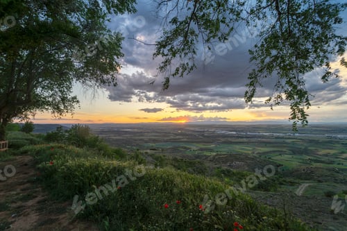 Preview: Dramatic landscape at the viewpoint of Los Santos de la Humosa at sunset with thunderstorm forming.