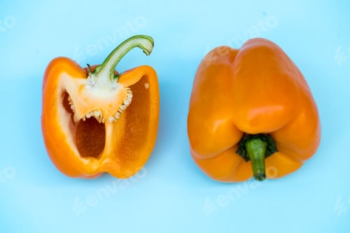 Preview: Aerial view of fresh sweet peppers on blue background