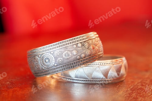 Preview: Indian silver bracelets on the shiny surface