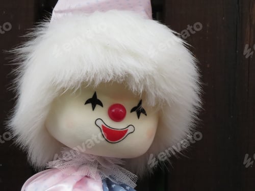 Preview: Closeup shot of a vintage clown doll