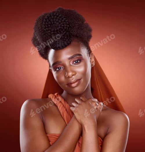 Preview: Cropped portrait of an attractive young woman posing in studio against a red background