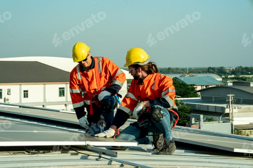 Preview: Engineer working setup Solar panel at the roof top. Engineer or worker work on solar panels or solar