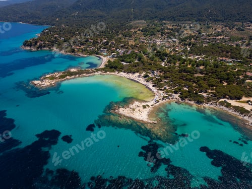 Preview: Aerial view of an island on Sithonia Peninsula, Greece, with beaches and rocks, surrounded by