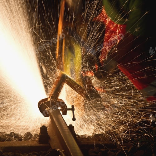 Preview: Anonymous man working with steel