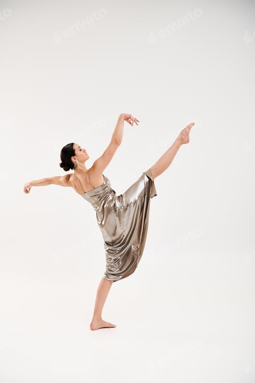 Preview: Ethereal Elegance: Young Woman Twirling in Silver Dress