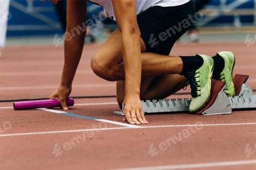 Preview: start man runner with baton in hand