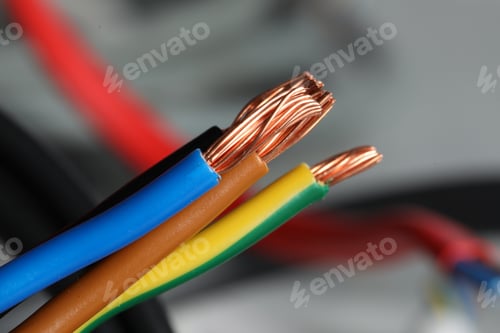 Preview: Colorful electrical wires on blurred background, closeup