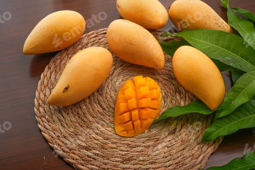 Preview: Ripe mango on wood,Ripe Mango Slice on wooden cutting board