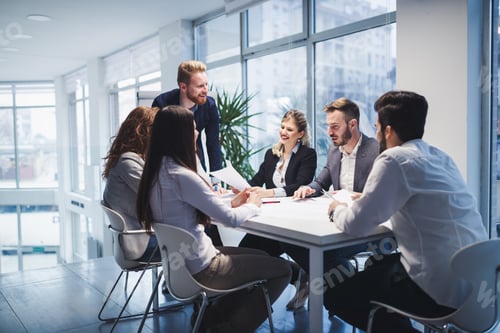 Preview: Group of business people collaborating in office