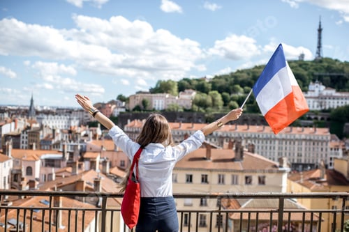 Preview: Woman with french flag in Lyon