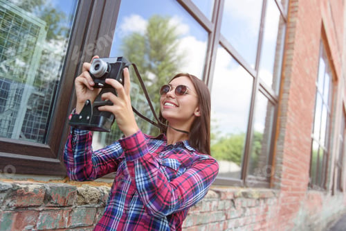 Preview: Cute Girl Taking Photos Outdoors