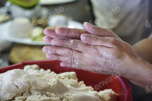 Preview: Closeup of a person making handmade tortillas