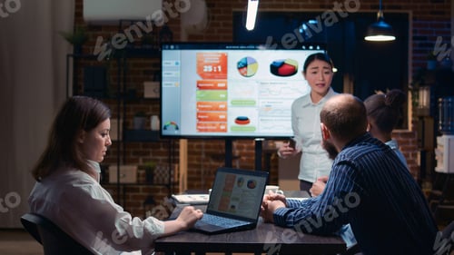Preview: Business analytics team meeting, woman showing corporate presentation