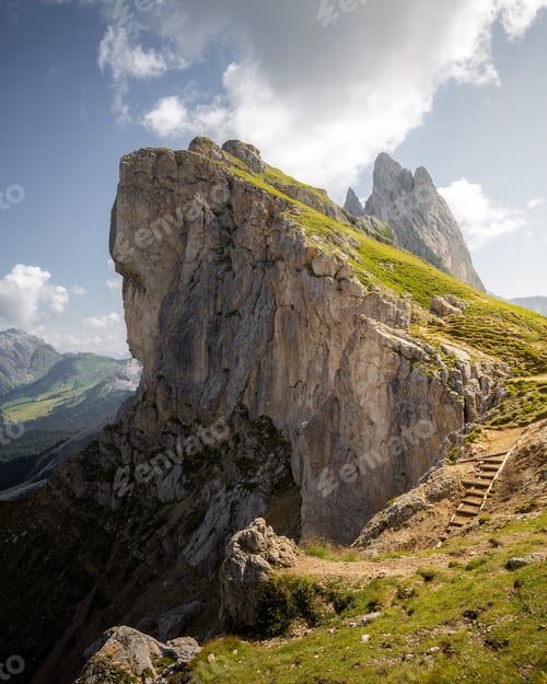 Preview: Vertical shot of a rocky edge of a mountain
