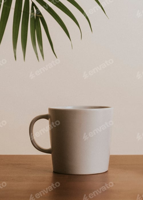 Preview: Earth tone color ceramic coffee cup on wooden table