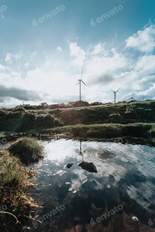 Preview: Wind Turbines Windmill Energy on the nature, during a super sunny day, with copy space