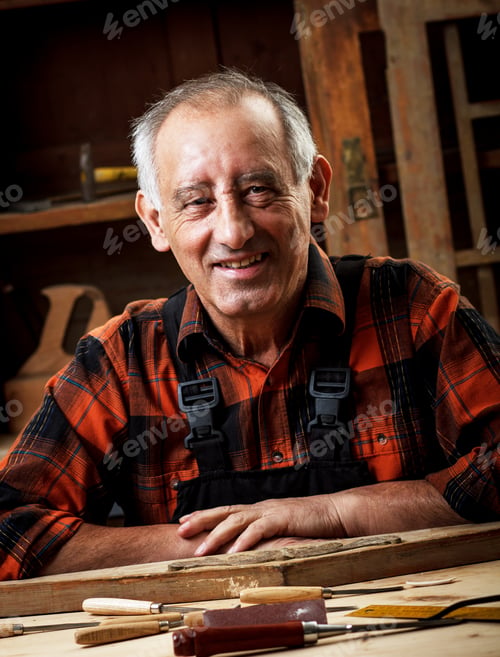 Preview: Portrait of senior carpenter in his workshop.