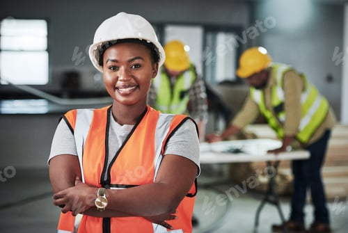 Preview: Portrait of a confident young woman working at a construction site