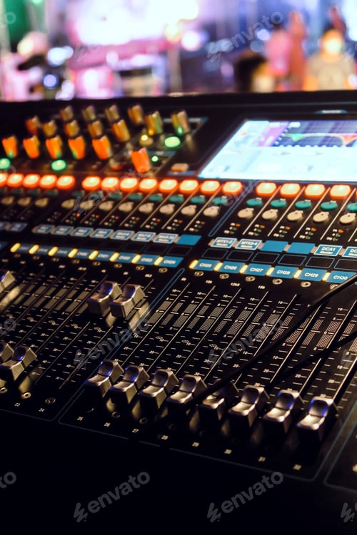 Preview: Closeup of an audio mixing control panel