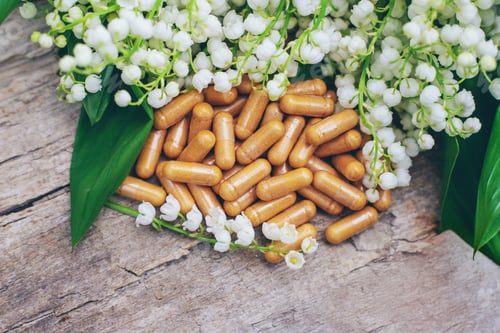 Preview: Lily of the valley and flowers supplements. Selective focus.