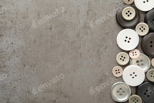 Preview: Many plastic sewing buttons on grey background, flat lay. Space for text
