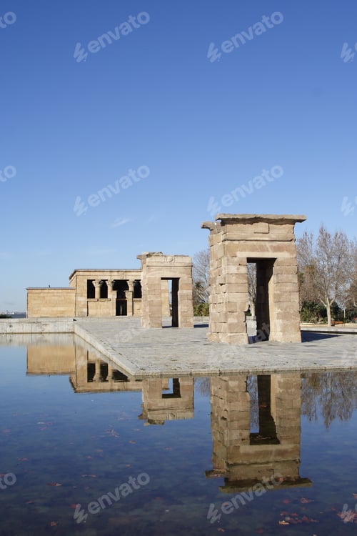 Preview: Natural view of the Debod Temple and sky reflecting on the water surface in Madrid, Spain
