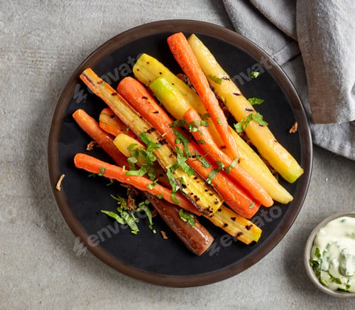 Preview: plate of grilled colorful carrots