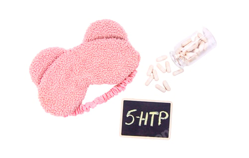 Sleep Mask, Pills and Chalkboard on White