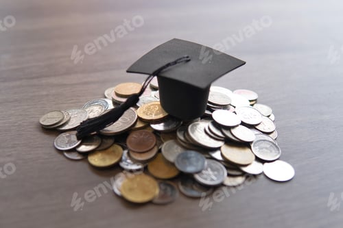 Preview: Graduation cap on top of a pile of coins.
