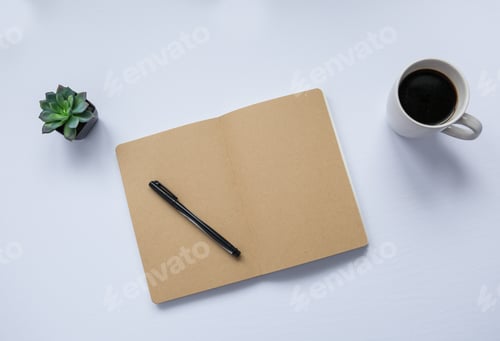 Preview: Open Notebook with Pen, Coffee, and Small Succulent