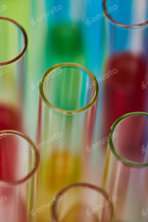 Preview: close up view of glass test tubes with colorful liquid