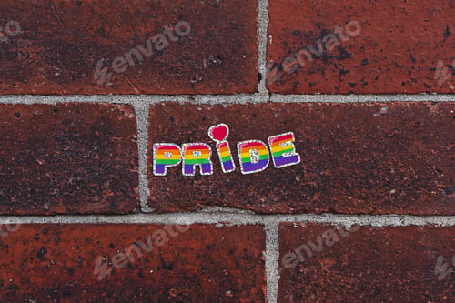 Preview: Rainbow Pride Sticker on Red Brick Wall