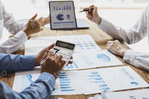 Preview: Business Meeting Analyzing Data at the Office