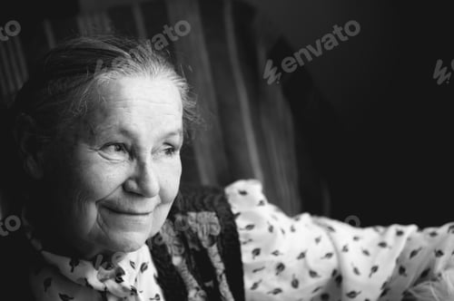 Preview: Portrait of smiling old woman face,natural light, black and white