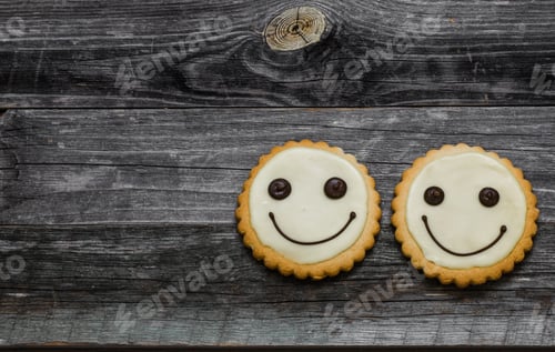Preview: cookies smile on a beautiful wooden background