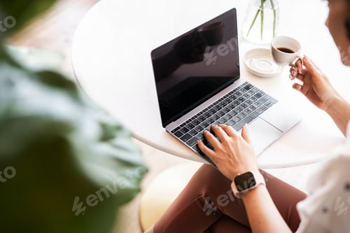Preview: Woman working on a laptop