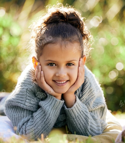 Preview: Happy girls love being in nature. Shot of a little girl spending time at a park.