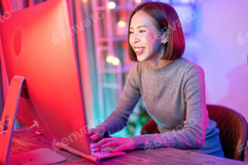Preview: At home game player wearing headset have fun play battle streaming online game