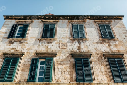 Preview: low angle view of historical building and clear blue sky in Dubrovnik, Croatia