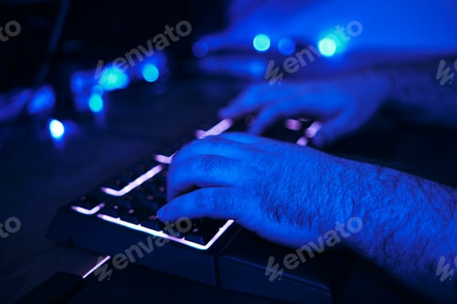 Preview: Keyboard of a Gamer Man Playing On The Computer.