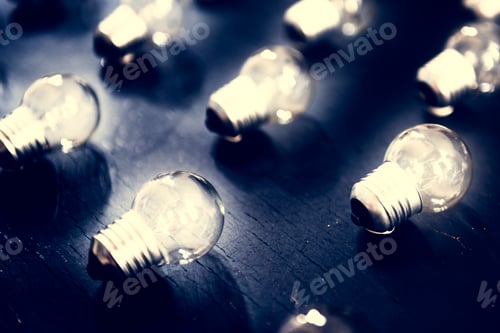 Preview: Dramatic Lighting of Many Light Bulbs on Surface