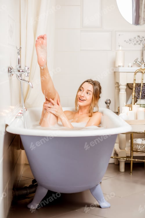 Preview: Woman washing in the bathroom