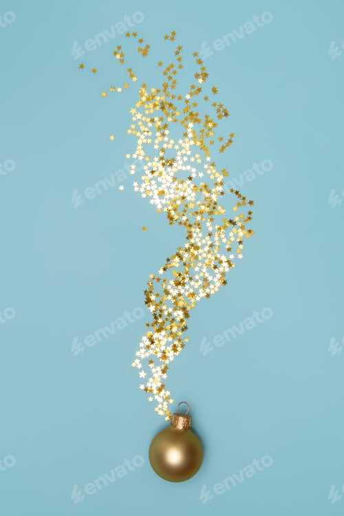 Preview: Golden Christmas ball with star shaped golden confetti on light blue background