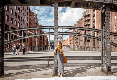 Preview: Business woman on the iron bridge