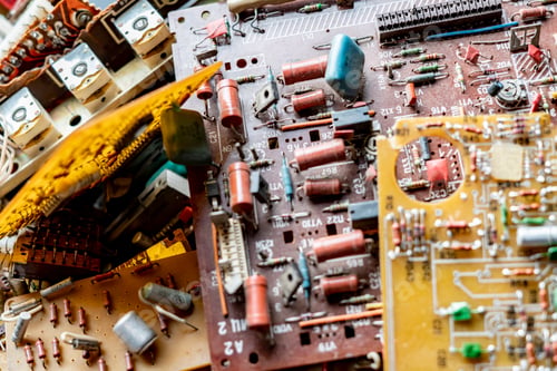 Preview: closeup photo of bunch of computer electric detail on dark background b