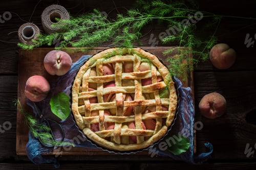 Preview: Tasty and hot peaches pie made of fresh ingredients