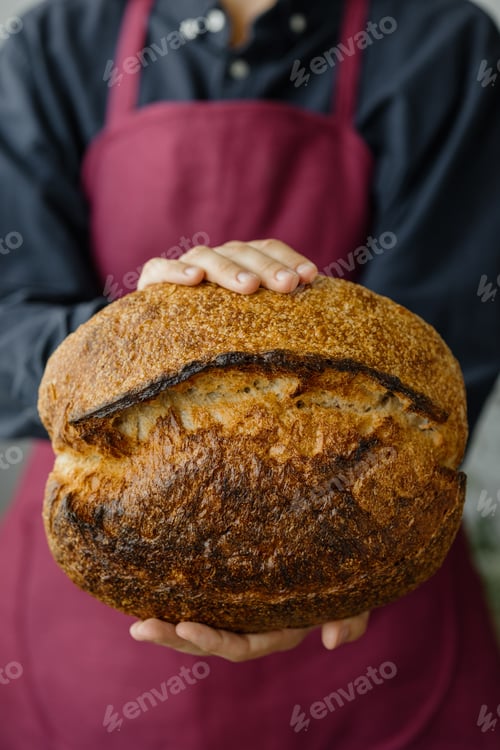Preview: woman making bread in bakery or at home for her family